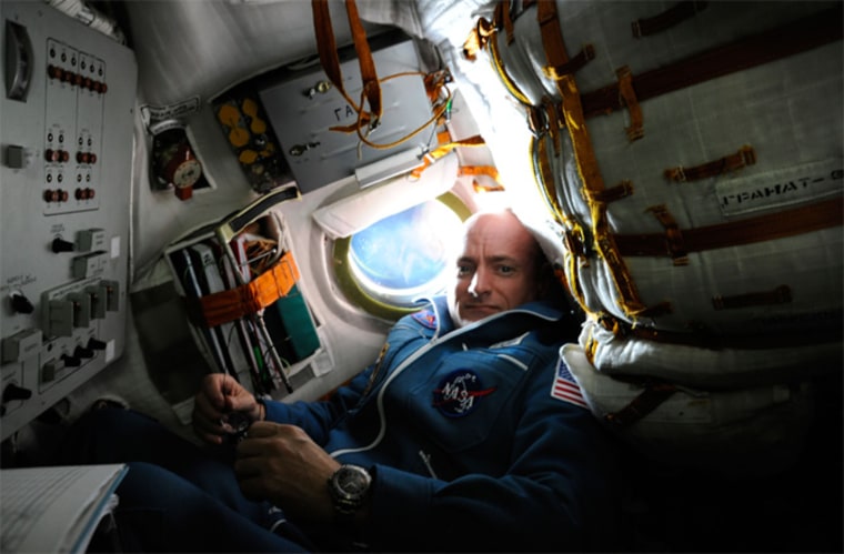 Scott Kelly aboard the Soyuz TMA-01M spacecraft on docking day with the International Space Station on Oct. 9, 2010.