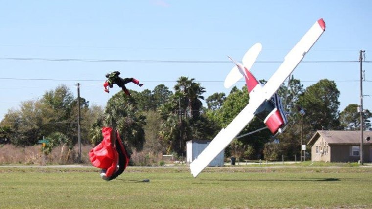 A small private plane piloted by Sharon Trembley crashes to the ground after getting tangled in skydiver Steve Frost's parachute on March 8.