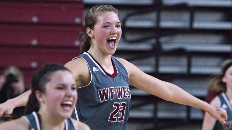W.F. West's Julie Spencer (23) runs to the bench as time expires in the girls' 2A state basketball championship game against Mark Morris, Saturday, Ma...