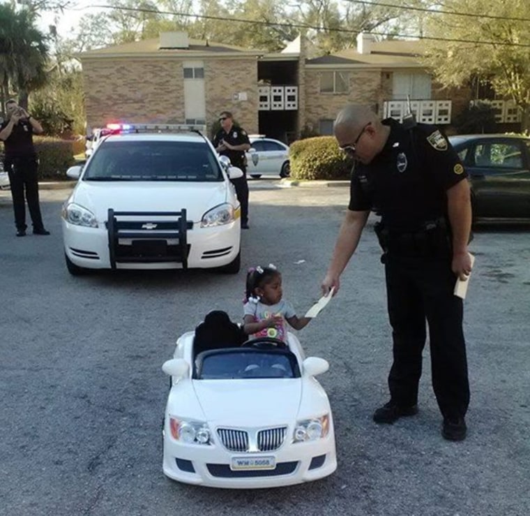 Police ticket toddler convertible driver in adorable viral photo