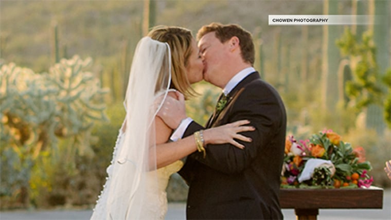 The newlyweds seal the ceremony with a kiss.