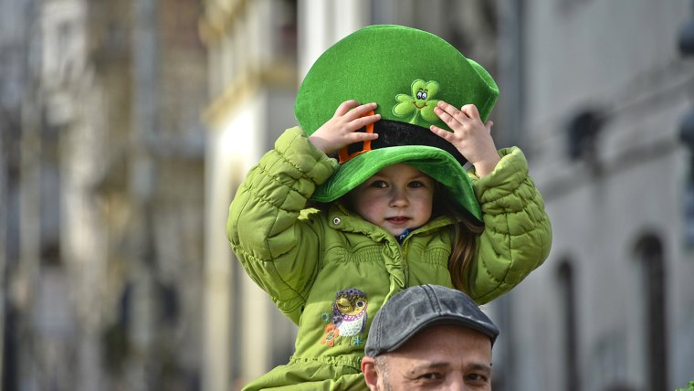 Image: Child with leprechaun hat celebrates St. Patrick's Day