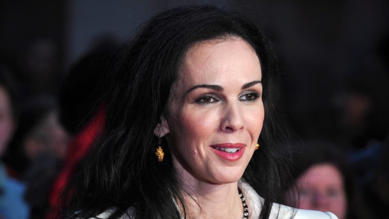The late fashion designer and stylist L'Wren Scott, shown here attending the world premiere of a documentary about the Rolling Stones on Oct. 18, 2012...