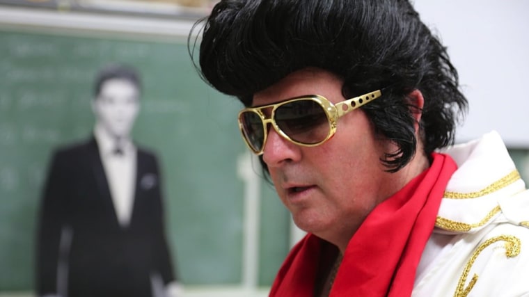 Teacher Frank Cooper channels Elvis at Charles Page High School in Sand Springs, Okla.