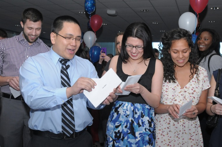 Roger Luo and Gaby Chancay open their envelopes revealing their residency assignments — mere moments before the marriage proposal.