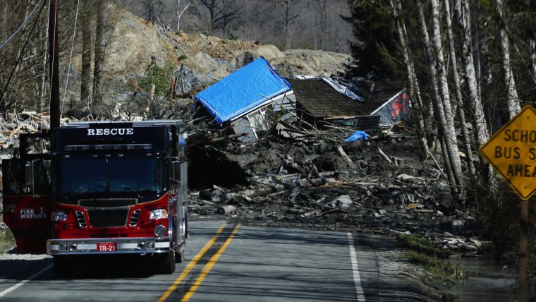 Searchers are \"dealing with devastation,\" said the county's emergency management director.