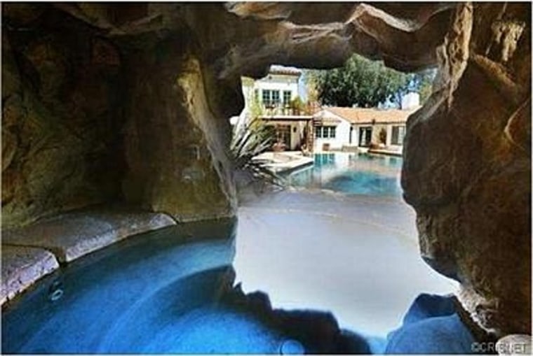 The Spanish-style home that rocker Pink is selling in Sherman Oaks has a pool with an in-ground cave-like spa tucked behind a waterfall.