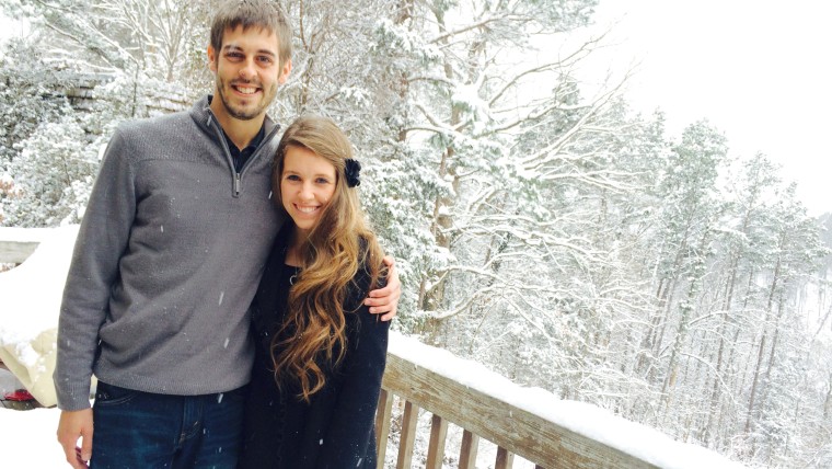 Jill Duggar and Derick Dillard share a snowy scene.