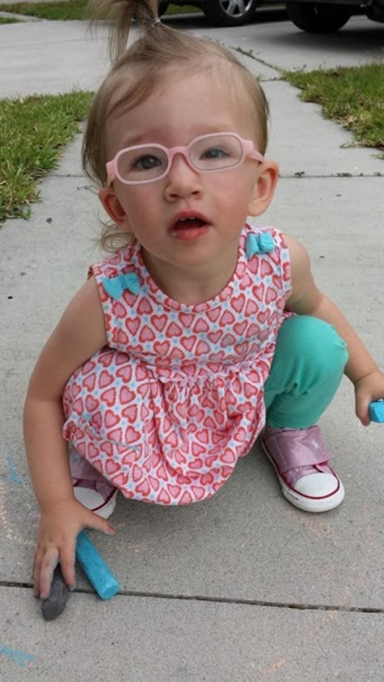 Ella,19 months, is blind in her left eye but it doesn't hold her back one bit.