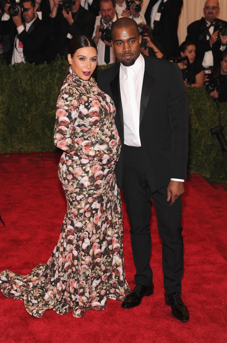 Kim Kardashian and  Kanye West attend the Costume Institute Gala for the \"PUNK: Chaos to Couture\" exhibition at the Metropolitan Museum of Art on May 6, 2013 in New York City.