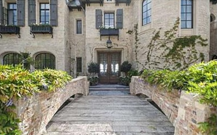 The estate of Tom Brady and Gisele Bundchen includes imported limestone and reclaimed cobblestones.