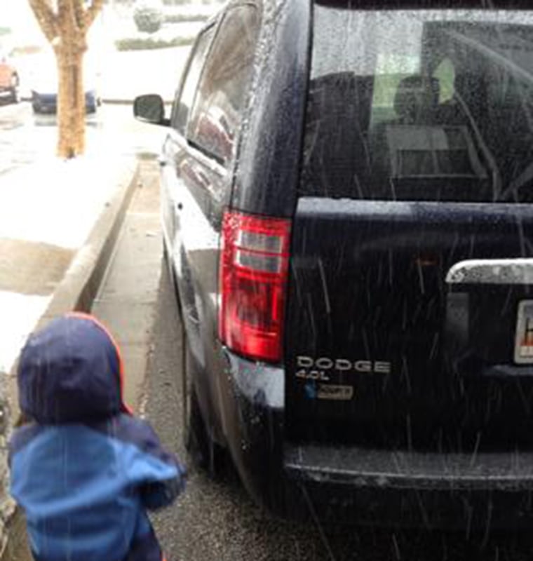 Sarah Zylstra Meyer  says, \"Here's our 2010 Dodge grand caravan minivan! GA valentine snowstorm  my son had fun \"brushing\" the snow off! We love our v...
