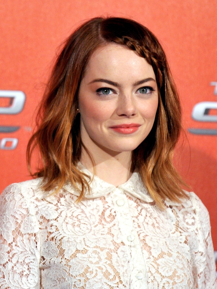 US actress Emma Stone poses during a photocall of the film  'The Amazing Spider-Man 2' in Rome on April 14, 2014 AFP PHOTO / TIZIANA FABI        (Phot...