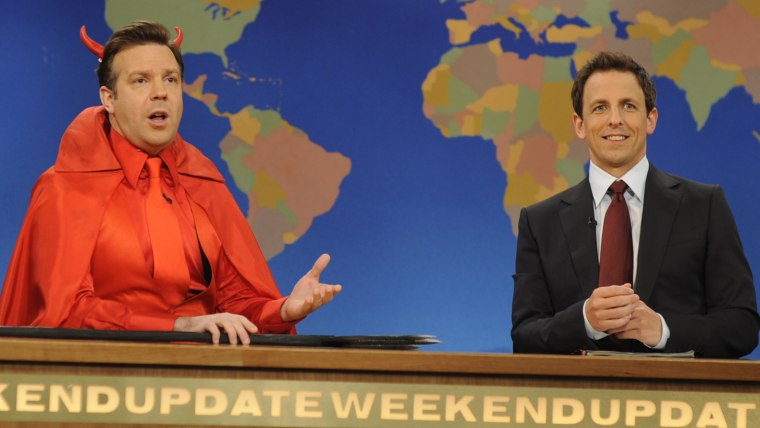 Jason Sudeikis as the Devil, with \"Weekend Update\" anchor Seth Meyers in 2011.