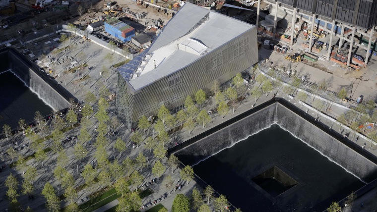 The entrance to the 110,000-square-foot National September 11 Memorial Museum, center, is located between the two reflecting pools at the World Trade Center in New York. The unidentified remains of those killed at the World Trade Center on Sept. 11, 2001 were moved on May 10 to a repository located at bedrock level in the same building as the museum.