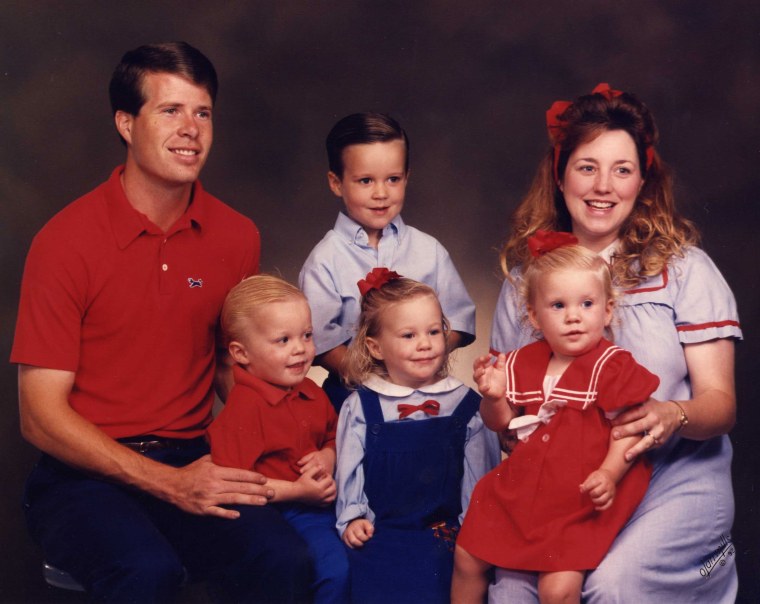 The Duggars in the 1990s with their four oldest children. They decided early on not to use birth control, and 19 children later, they're hoping for more, if possible.