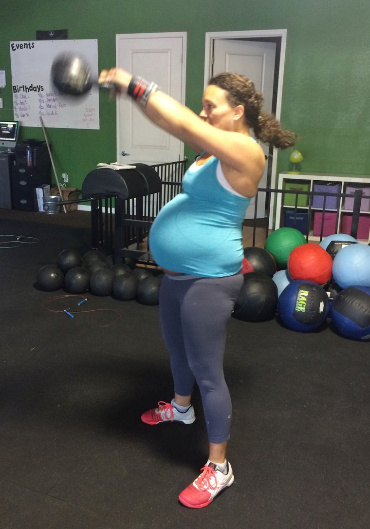 Meghan Leatherman is shown swinging kettle bells.