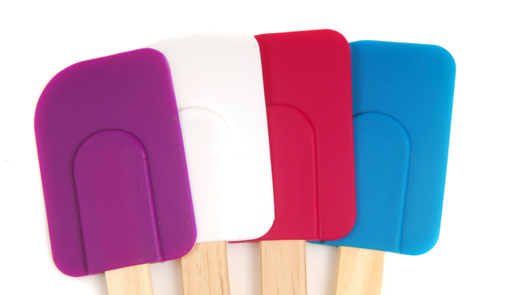Four rubber and silicone spatulas in different colors
