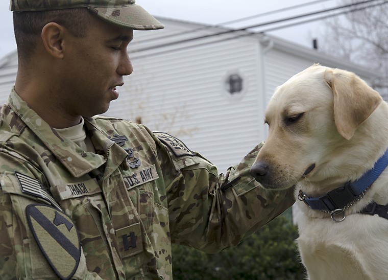“Her devotion and her caring demeanor have helped me so much on an emotional level,” retired Capt. James Van Thach said of his service dog, Liz.