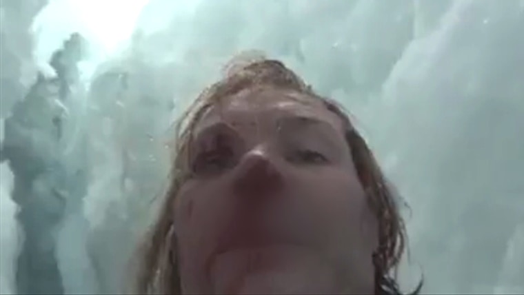 American climber John All survived a 70-foot fall into a crevasse on a mountain in Nepal. Here he is shown on cell phone video he took following the fall in which he broke five ribs and an arm.