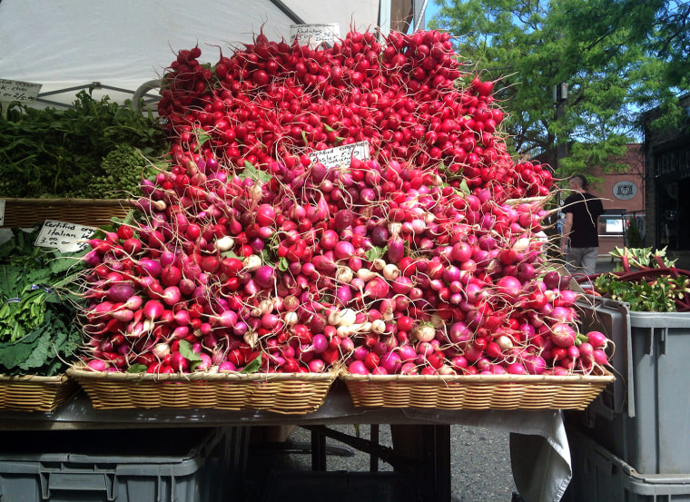 A table of radishes at the Ballard Farmers Market.