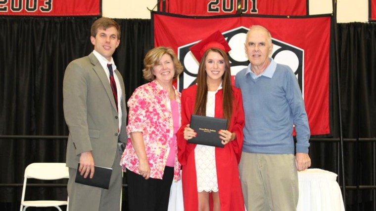 Georgia high school senior Annie Cusack was able to enjoy a happy moment with her father, Brian, who has battled colon cancer in the past year, along with her mother, Kathy, and older brother, Joe. Annie missed her official graduation because of kidney stones, but the school had a special ceremony just for her three days later with more than 50 of her classmates and all her teachers in attendance.