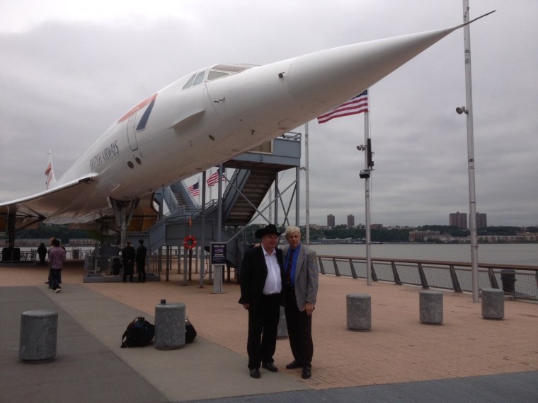 Fred Finn and Tom Stuker stand in front of a British Airways Concorde jet at the Intrepid Sea, Air & Space Museum on Wednesday in New York City.