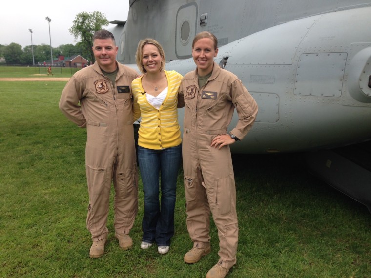 Dylan poses with members of the U.S. Marine Corps.