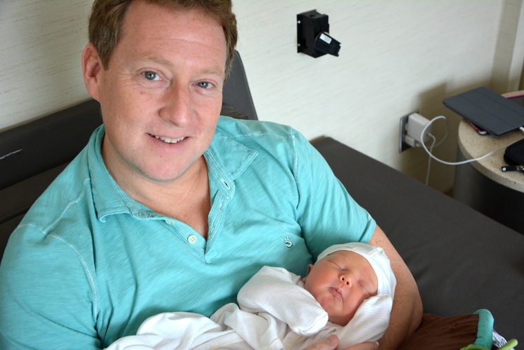 Proud papa: \"It was love at first sight,\" Mike Feldman says of baby Vale.