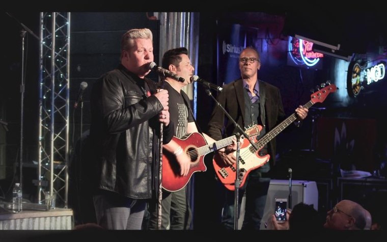 TODAY's Lester Holt joins The Rascal Flatts on stage at the Diffle and Steel Guitar Grill in Nashville.