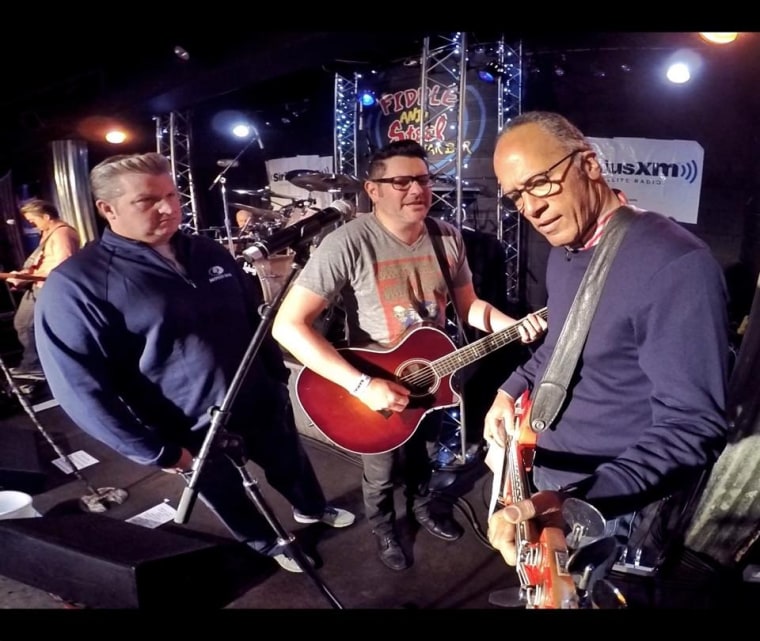 TODAY's Lester Holt plays bass at The Rascal Flatts' performance at the Fiddle and Steel Guitar Bar in Nashville.