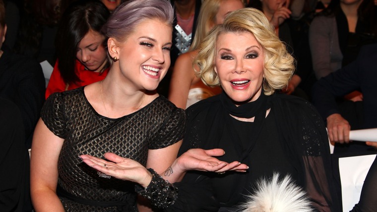 Image: Kelly Osbourne and Joan Rivers attend the Badgley Mischka Fall 2012 fashion show in New York City.