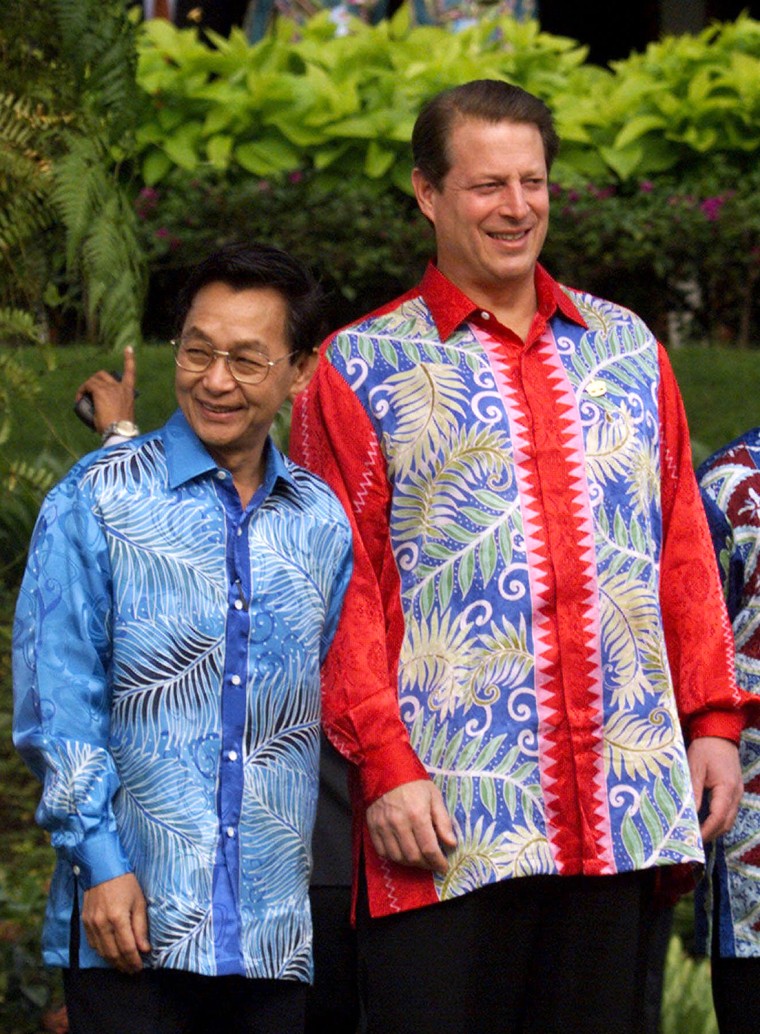 U.S. Vice President Al Gore, right, wearing a batik shirt poses for photographers with Thai Prime Minister Chuan Leekpai at the Asia-Pacific Economic ...