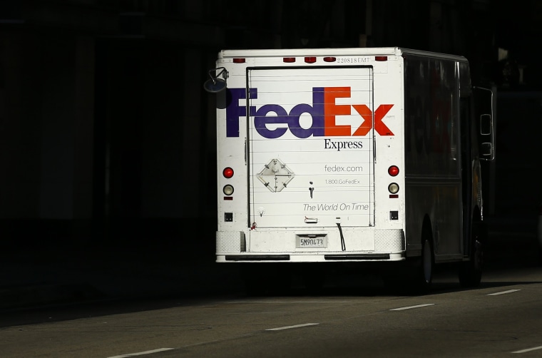 A Federal Express truck on delivery is pictured in downtown Los Angeles, California October 29, 2014.