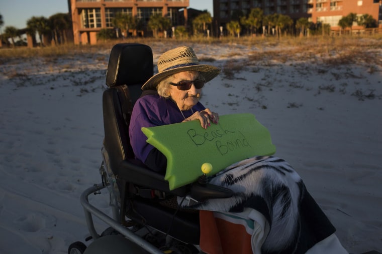 Ruby Holt, a 100-year-old Tennessee native, heads toward the beach for the first time in her life Wednesday, Nov. 19, 2014, in Orange Beach, Ala. The ...