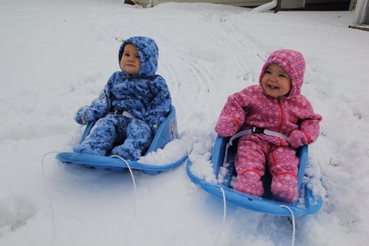 Twins sledding in Buffalo, NY