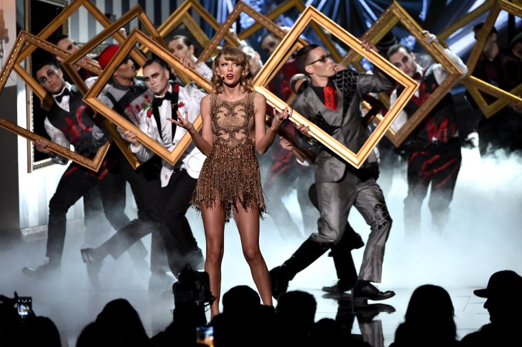 Image: Taylor Swift performs at the 2014 American Music Awards.