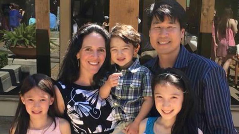 Victor Ho, Arielle Lawson and their family.