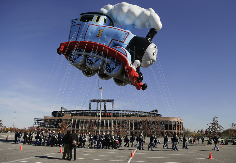 Handlers steer Thomas the Tank Engine through the parking lot at CitiField on Nov. 8.