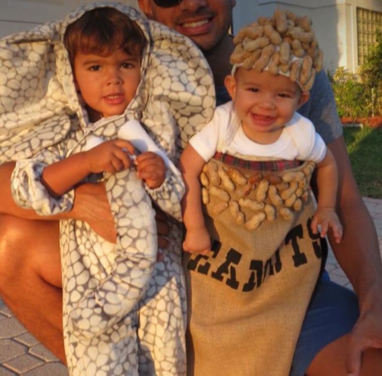 Cutest duo: Sarah Casey Phillips shows off her little elephant and his bag of peanuts.