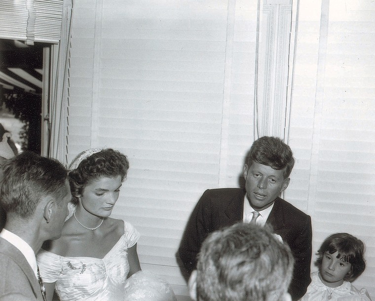 Jackie Kennedy and JFK at their wedding reception