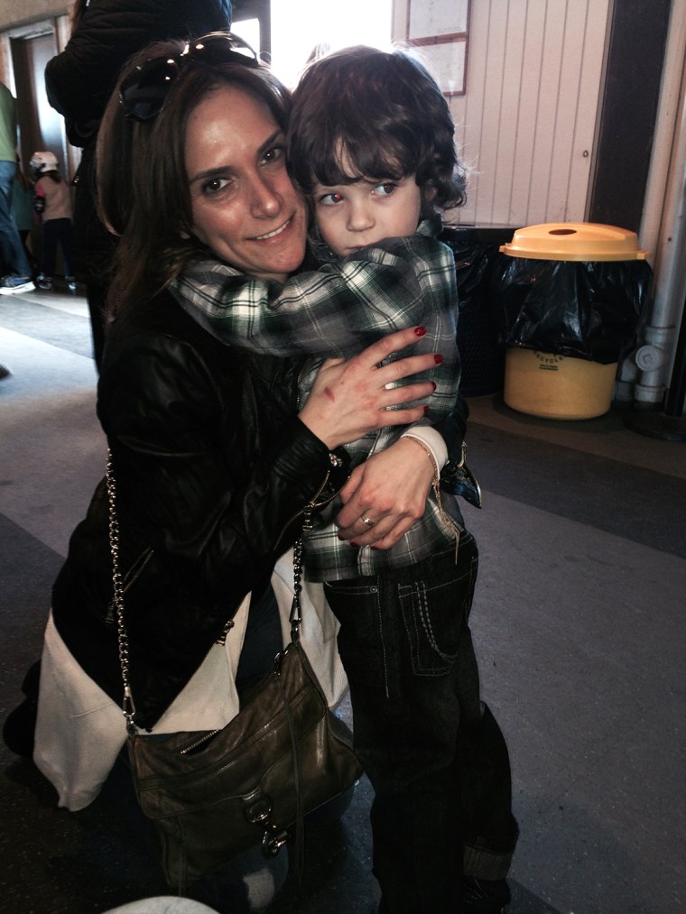 Melissa Girard and her son