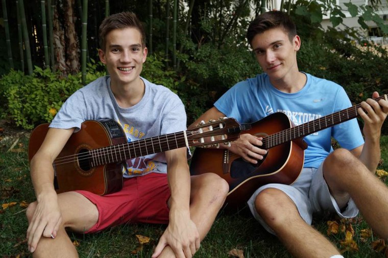 German exchange student Simon (left) and host brother Garrett, both 16, play soccer together and have formed a band.
