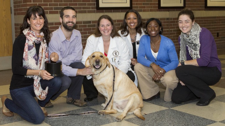 (L-R) Charlie and her owner Jessica Parsons with the veterinary medical team that treated Charlie at Purdue University Veterinary Teaching Hospital (D...