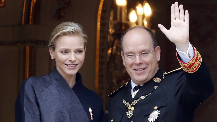 epa04232563 (FILE) A file picture dated 19 November 2013 shows Monaco's Prince Albert II and his wife, Princess Charlene attending the Army Parade dur...