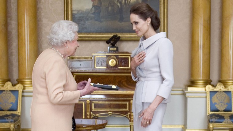 Angelina Jolie meets Queen Elizabeth II at Buckingham Palace on Friday.