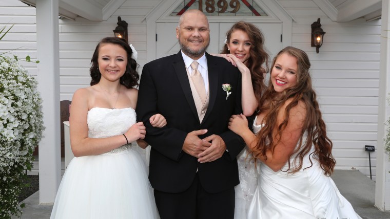 Kelvin Peters, 46, and his three youngest daughters.