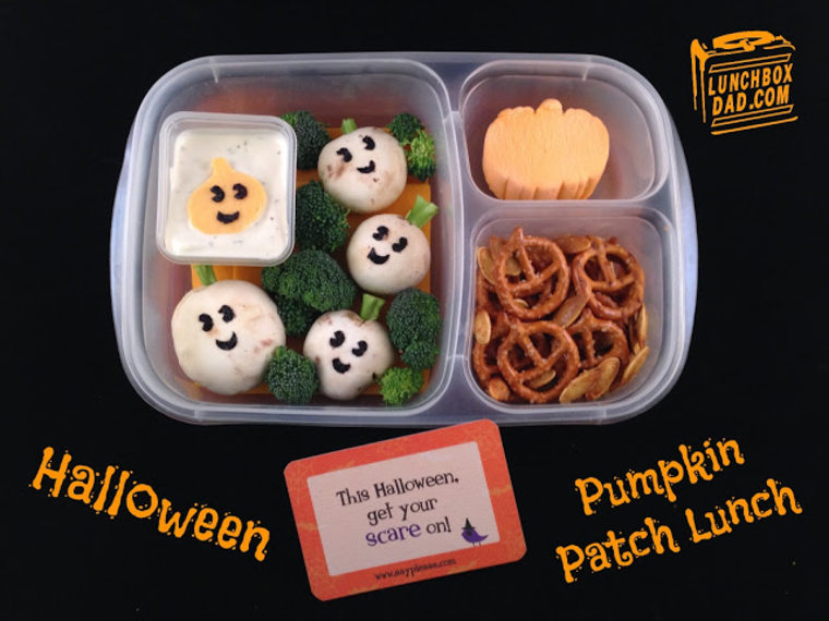 Veggies dressed as pumpkins are the main attraction in this lunch, combined with jack-o-lantern pretzels, pumpkin seeds and a pumpkin marshmallow.