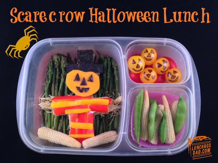 Tiny jack-o-lanterns are created from cherry tomatoes, and asparagus becomes a cornfield in this cute scarecrow lunch created by Coffron.