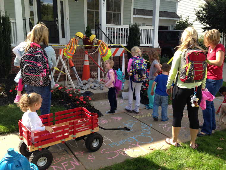 IMAGE: Neighbors look at skeletons